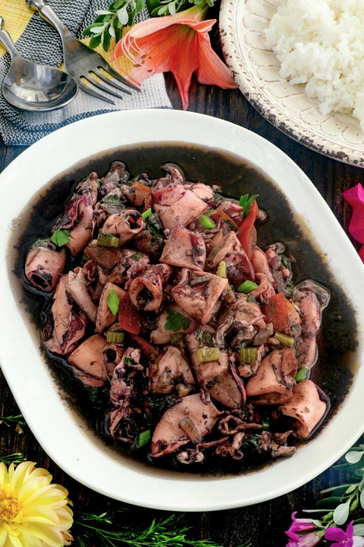 Adobong pusit in a serving platter.