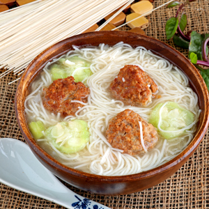 Meatballs and noodles soup.