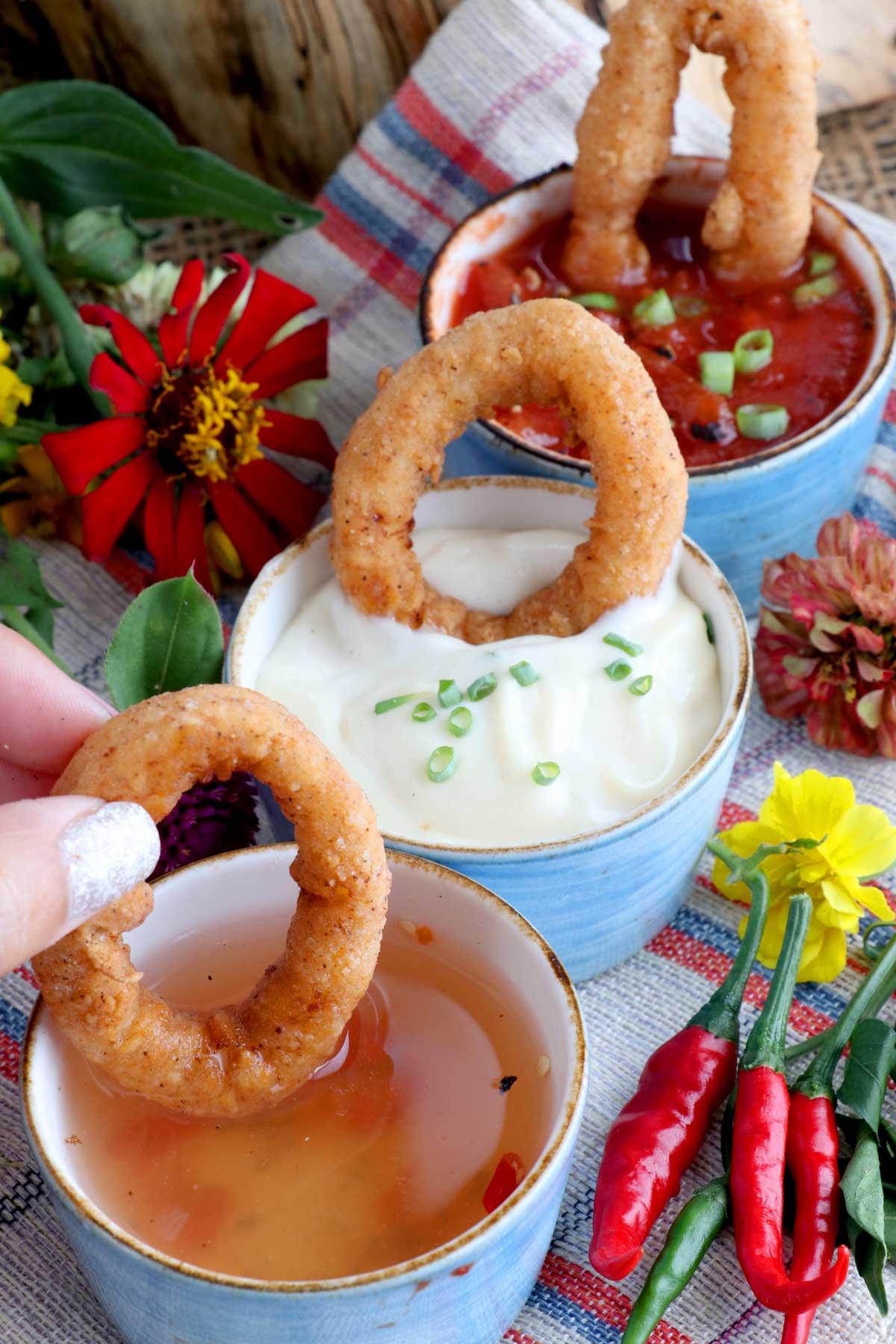 Calamares dipped in vinegar