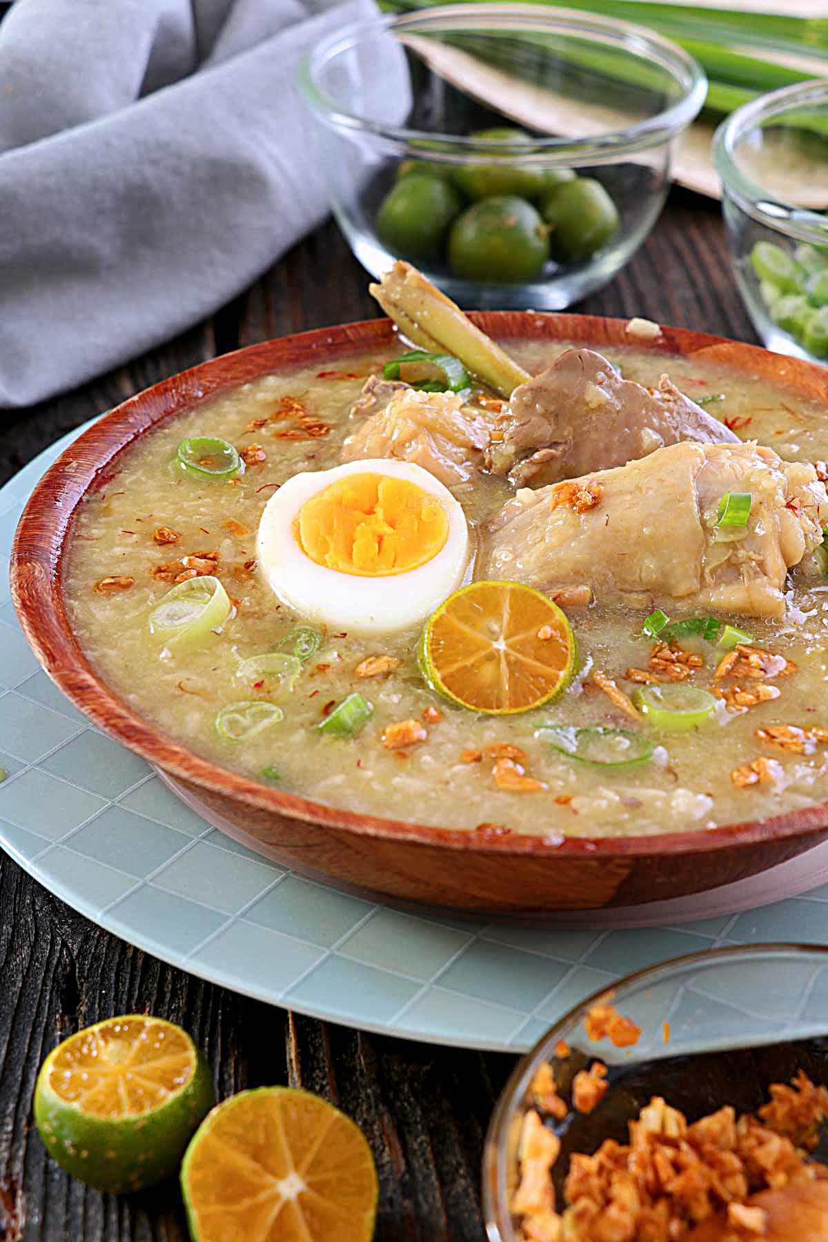 Chicken Arroz Caldo with egg, chicken liver, lemongrass, ginger, and crispy garlic