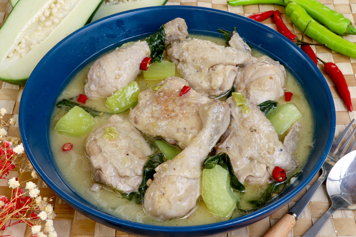 Creamy and spicy Chicken Halang halang with green papaya chunks, lemongrass, and chilies.