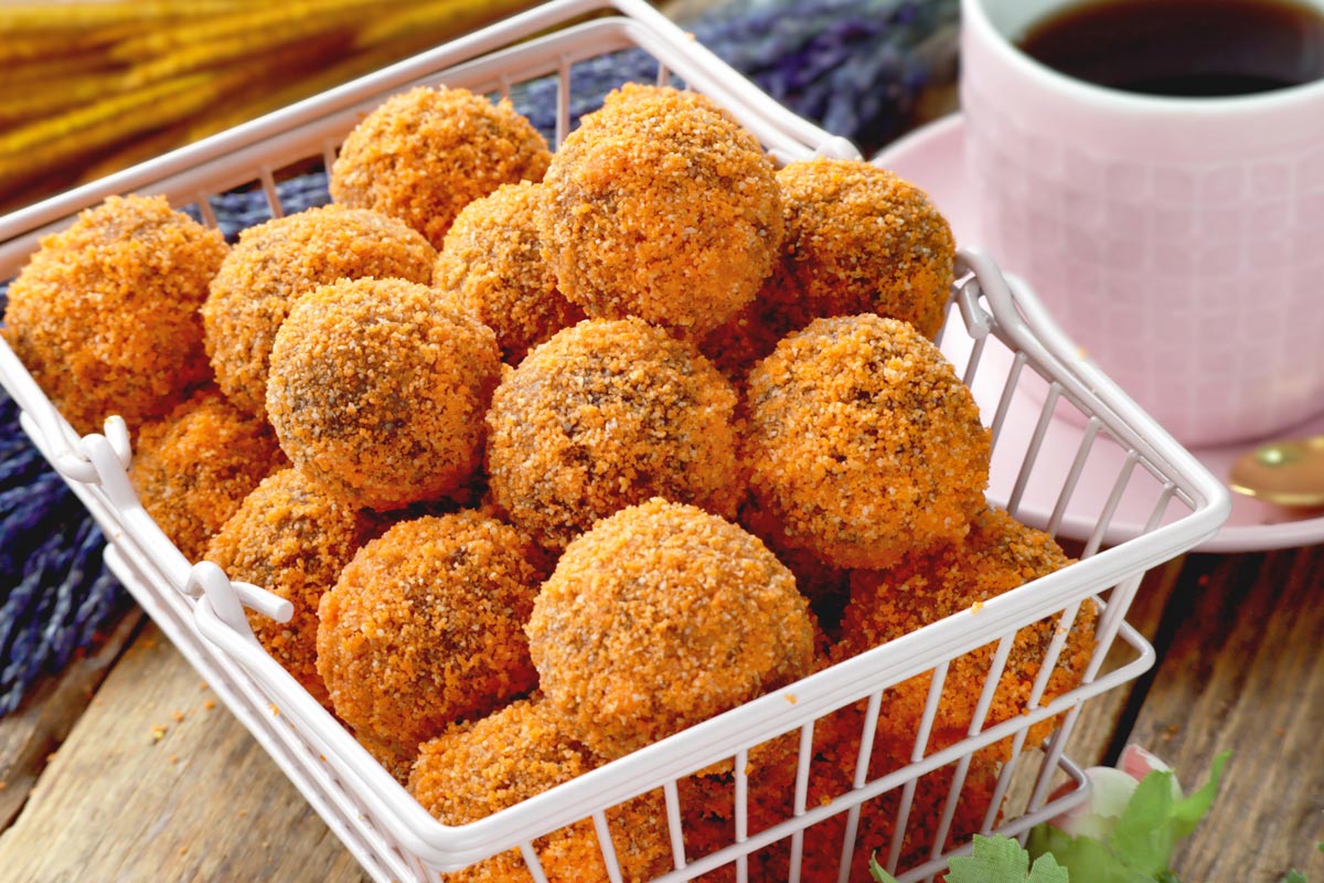 Homemade chocobutternut munchkins in a basket.