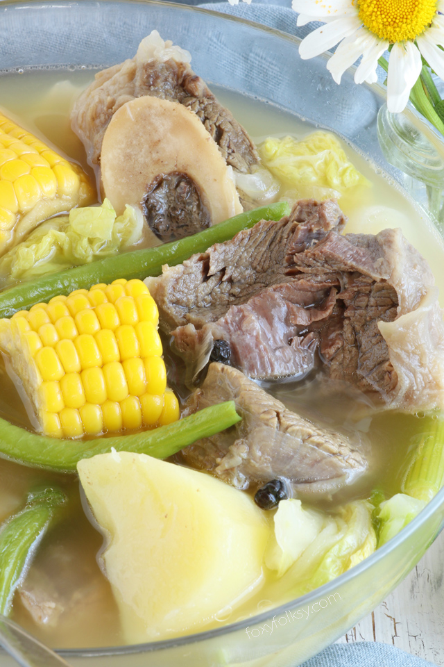 Nilagang Baka is a Filipino beef soup cooked until the meat is really tender and with vegetables like potatoes, beans and cabbage that makes this simple soup healthy and flavorful. | www.foxyfolksy.com