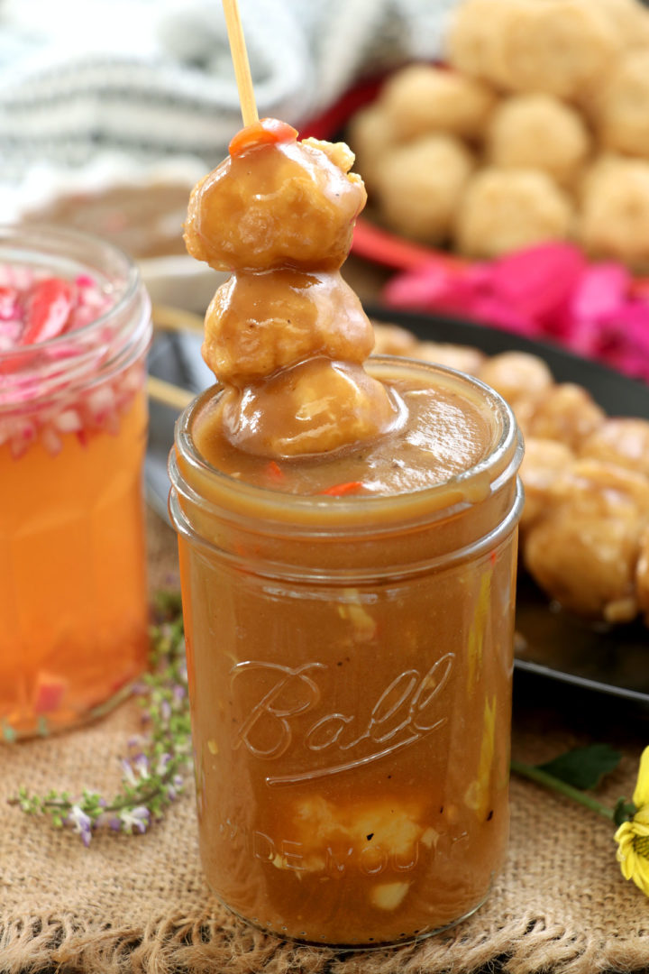 Fried fishballs dipped in special sauce.