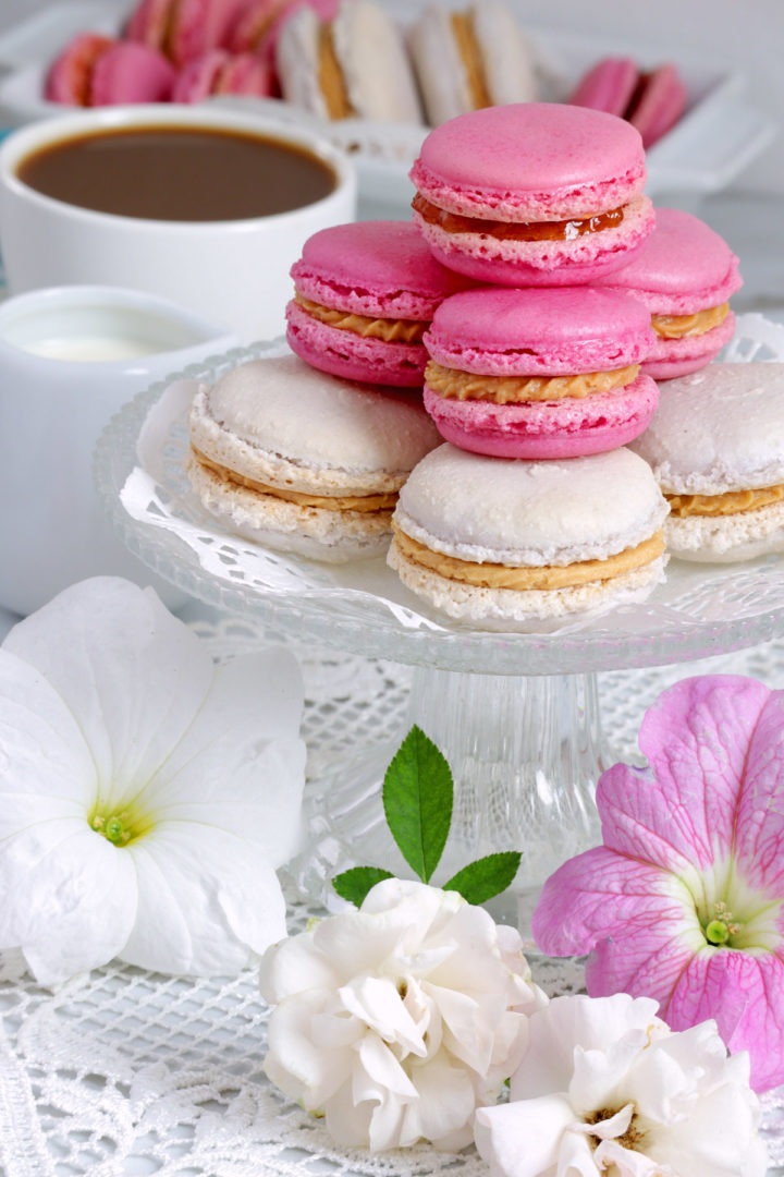 Homemade French macarons with jam and peanut butter frosting