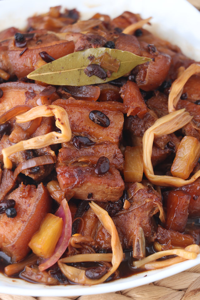 Braised pork belly with fermented black beans, banana blossoms and pineapple.