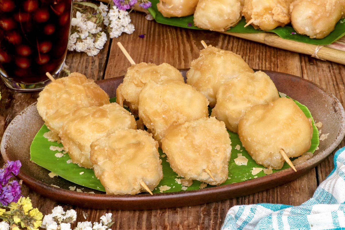 Karioka are fried sweet rice balls that are coated in caramelized sugar.