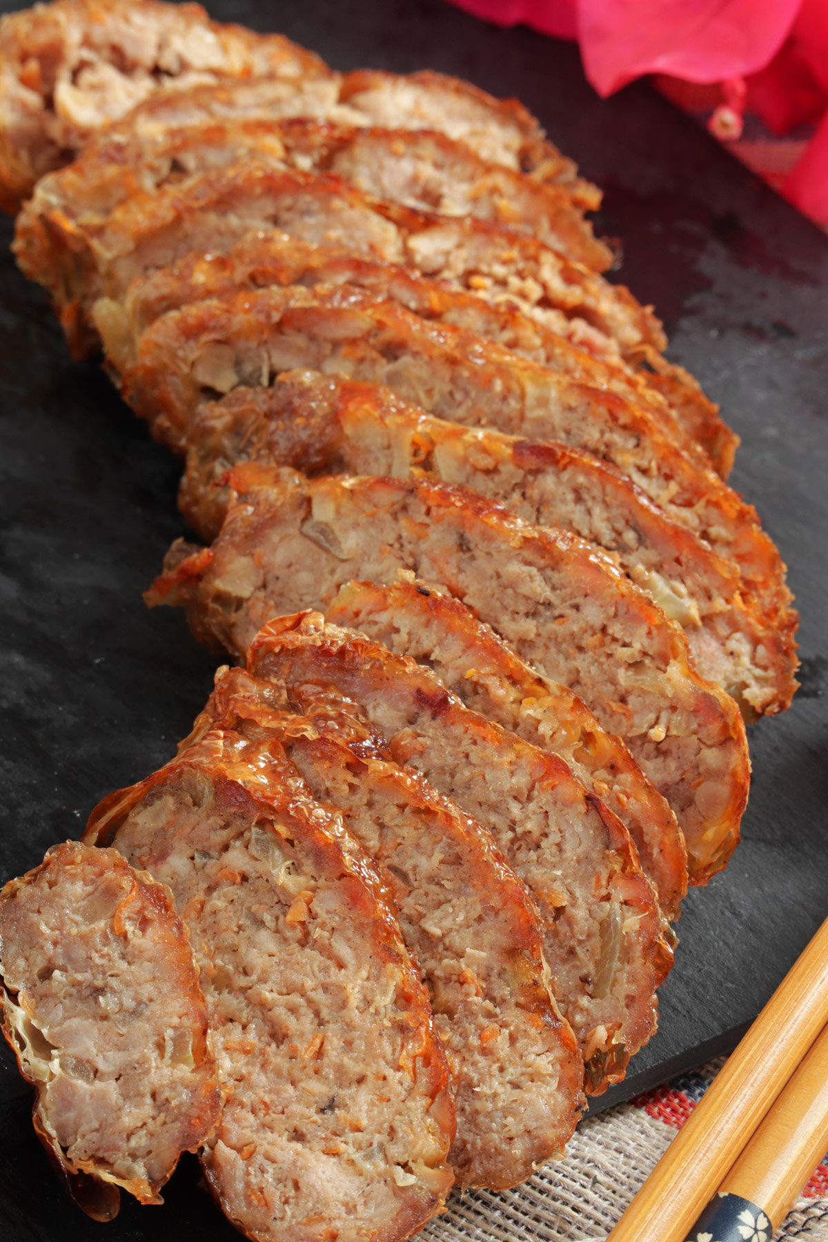 Minced meat seasoned with five-spice powder and rolled in bean curd sheet