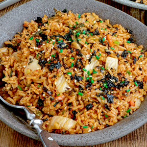 Kimchi fried rice made with gochujang, sesame oil, and Furikake.