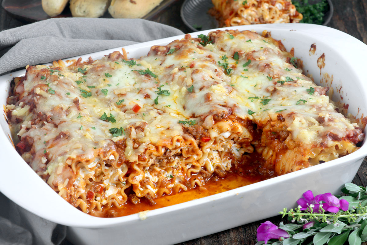 Rolled-up lasagna with meaty sauce and cheese filling.