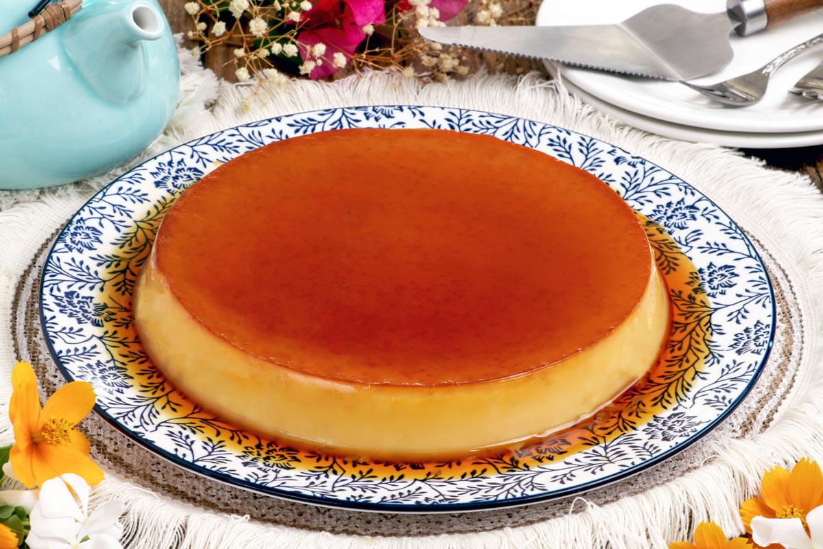 Whole egg leche flan on a serving platter.