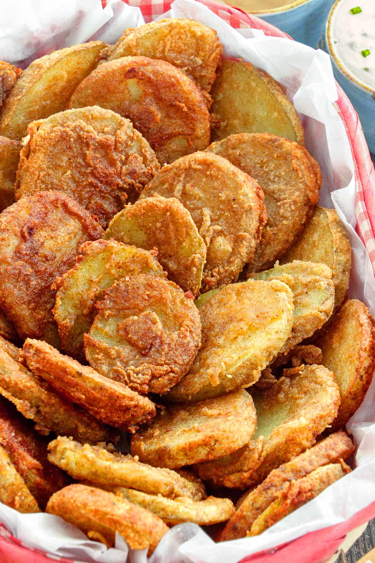 Golden Crispy Mojo Potatoes served in a basket.