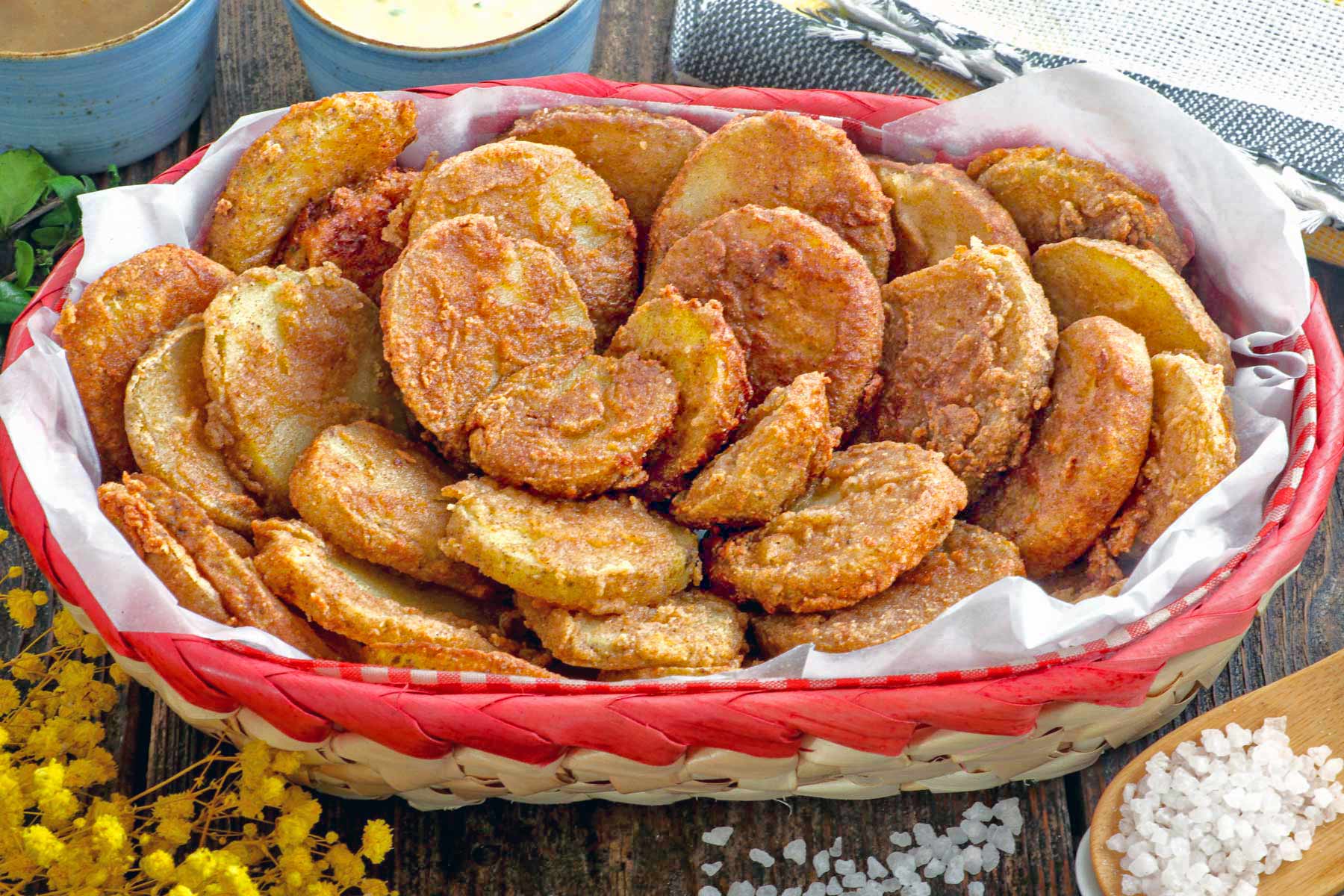 Crispy fried breaded potato slices. 