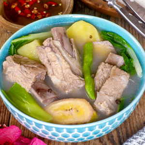 A hot bowl of nilagang baboy with saba banana, potatoes, and pechay.