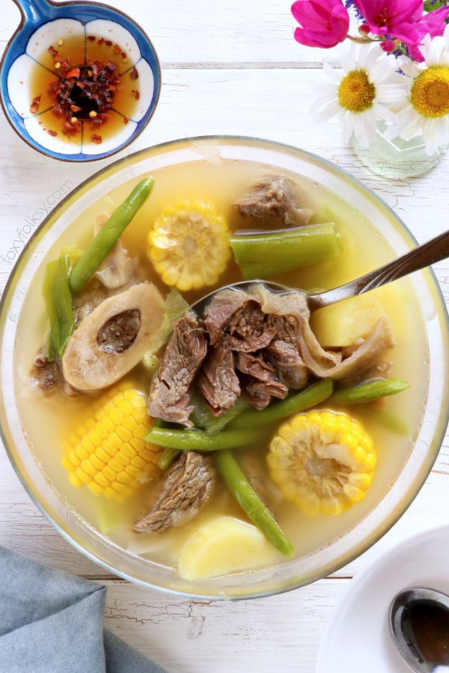 Nilagang Baka is a Filipino beef soup cooked until the meat is really tender and with vegetables like potatoes, beans and cabbage that makes this simple soup healthy and flavorful. | www.foxyfolksy.com