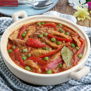 Pork Guisantes in a serving bowl.