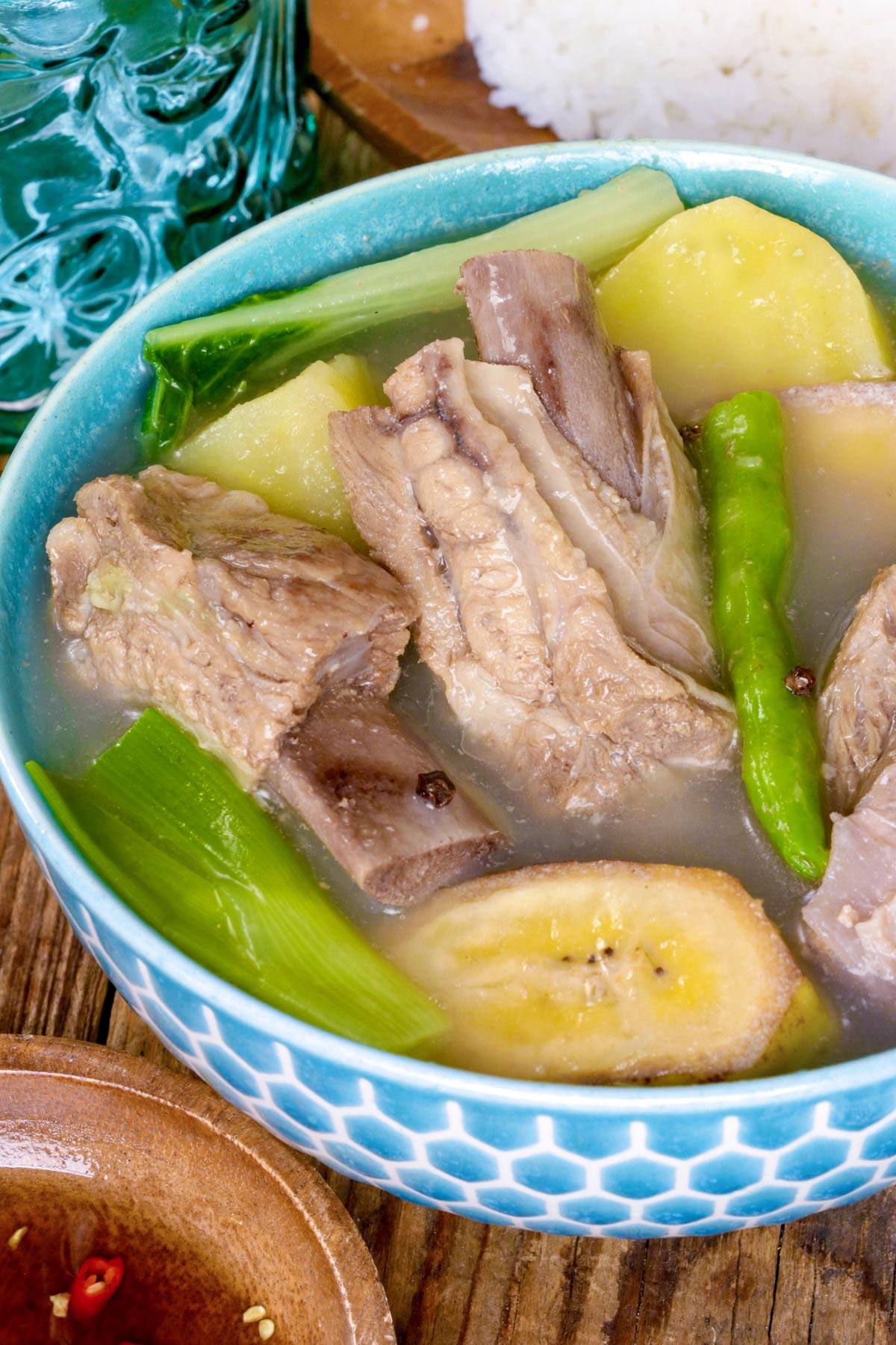 Hearty Pork Nilaga  made with pork ribs, potatoes, saba bananas. green beans and leek.