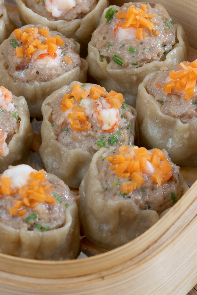 pork siu mai or shumai in a bamboo steamer