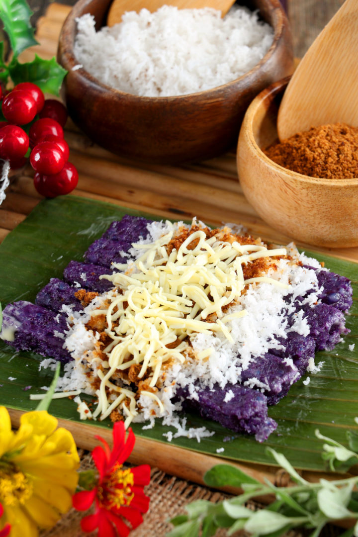 Steamed purple rice cake with grated coconut and muscovado