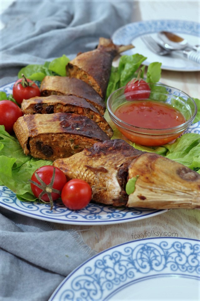 Try this Filipino Stuffed Milkfish or Rellenong Bangus recipe. Deboned, flaked and re-stuffed with vegetables and spices! Baked or fried to golden crisp! | www.foxyfolksy.com