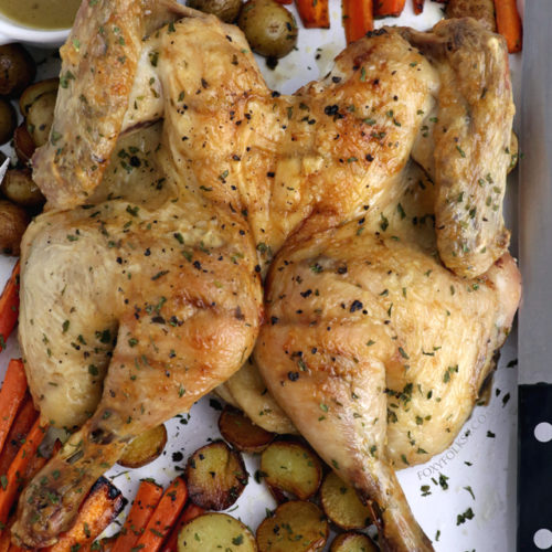 Get this super simple but delectable, juicy on the inside and crispy on the outside, roast chicken recipe! | www.foxyfolksy.com