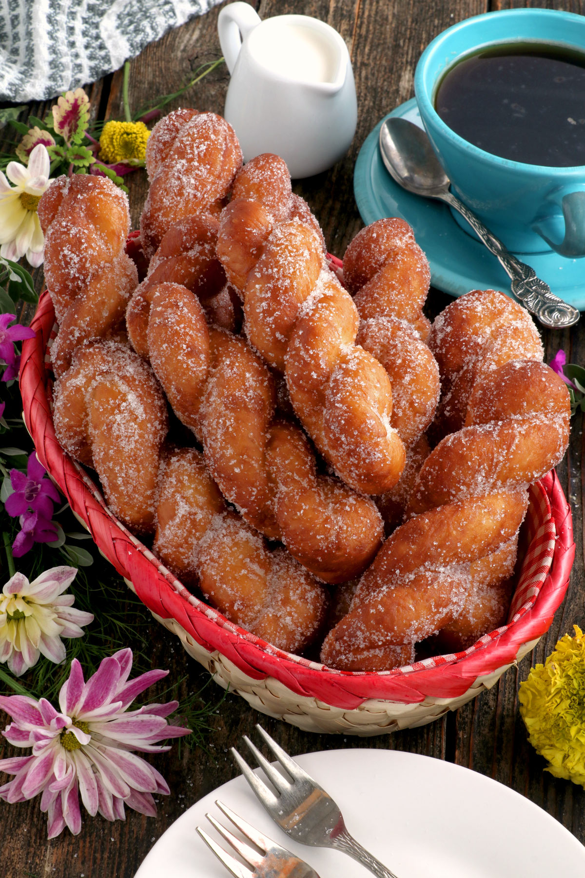 Bicho-bicho or Filipino twisted donuts served on a basket