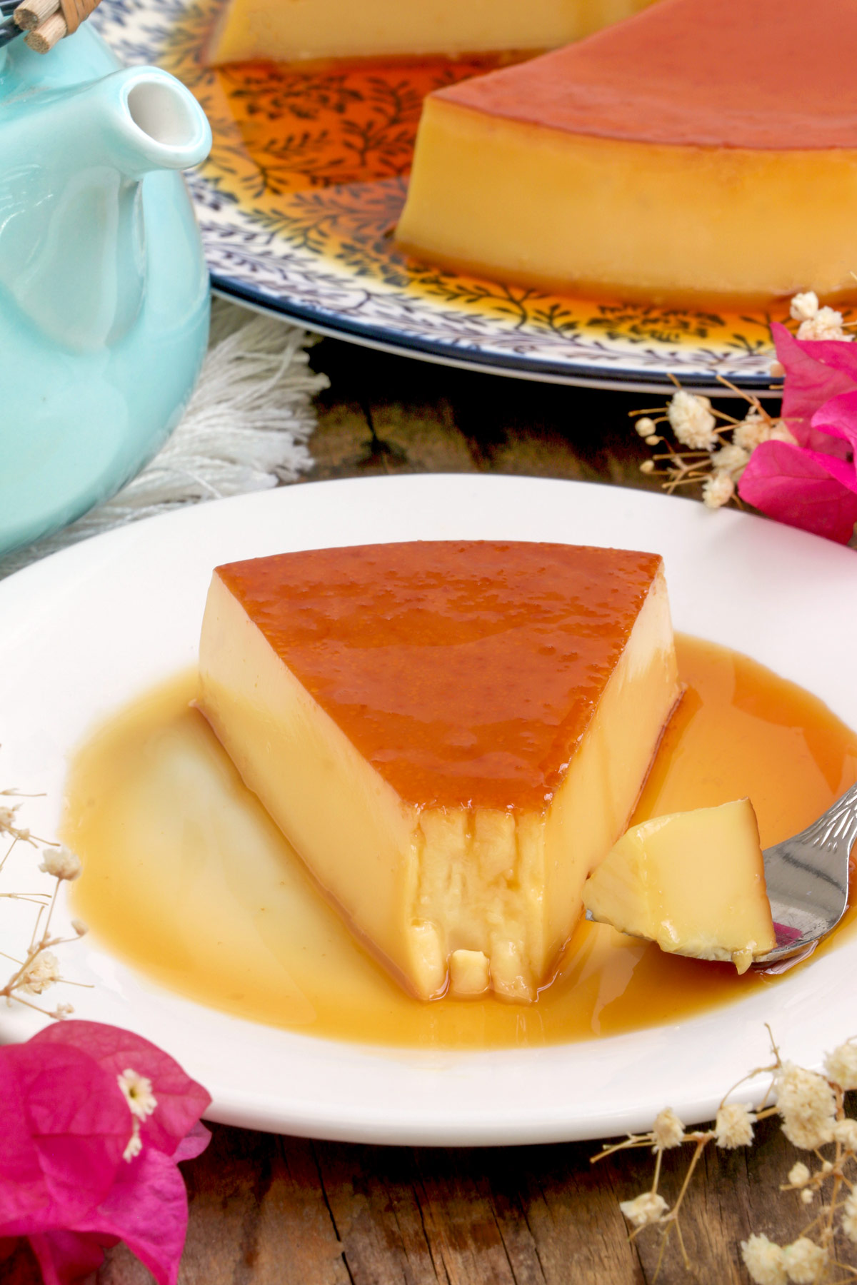 A slice of leche flan using whole  eggs.